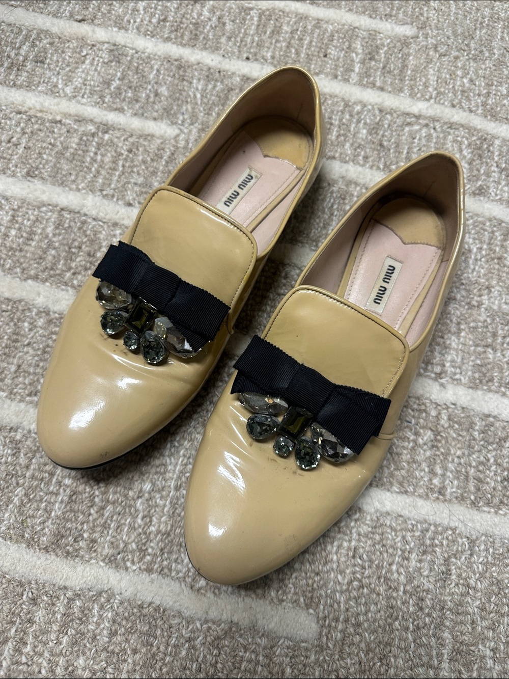 Miu Miu Nude Patent Leather Loafers with Black Bow and Crystal Accents